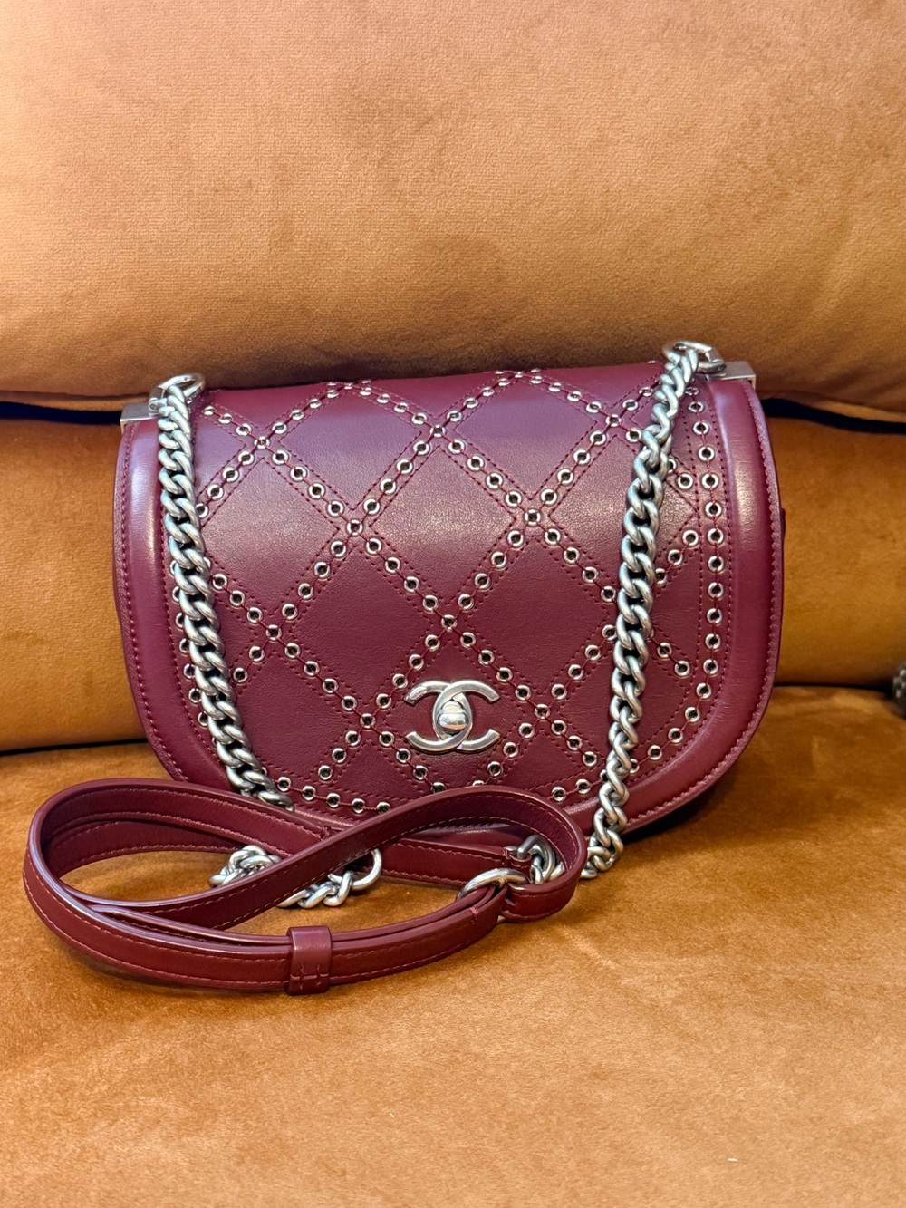 CHANEL
Calfskin Coco Eyelets Small Flap Bag - Burgundy